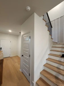 Engineered hardwood flooring and solid wood stair treads installed in Leander Tx