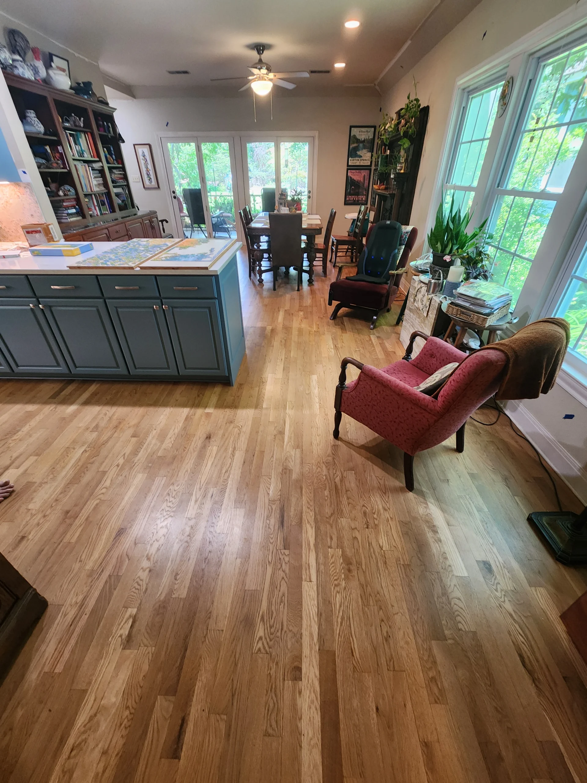 A photo of an Oak Hardwood Floor Refinished With Golden Oak Stain by The Habitat Heroes
