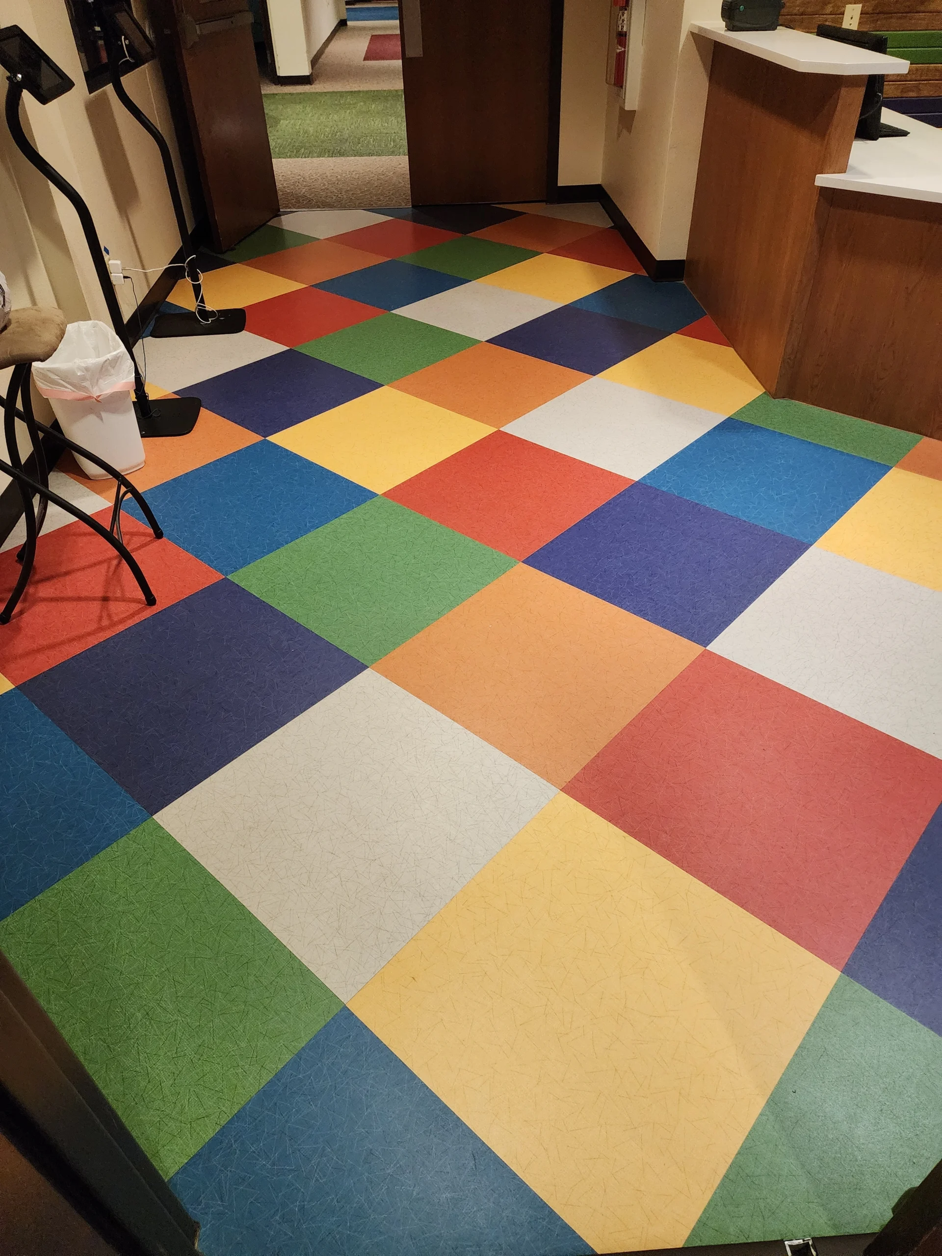 A photo of a Vinyl Tile Floor Installed in a school in San Marcos, Tx by The Habitat Heroes