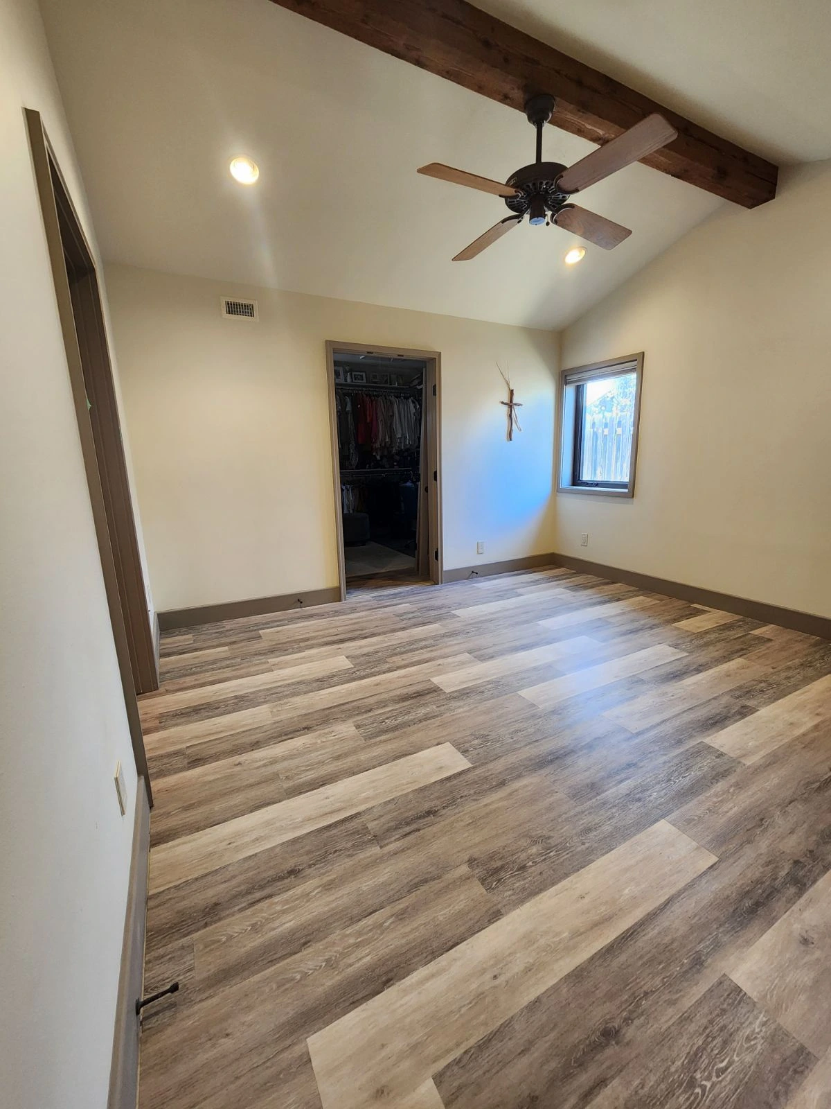 Light brown commercial vinyl plank flooring installed