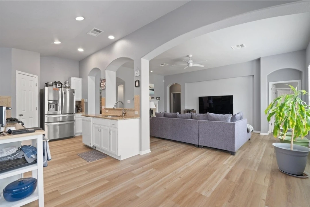 Interior painting and new floors by Habitat Heroes, a flooring contractor in Cedar Park, TX.